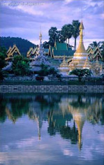 Wat Jong Kham Reflecting in Jong Kham Pond, Mae Hong Son, Thailand / Image by Joe Cummings